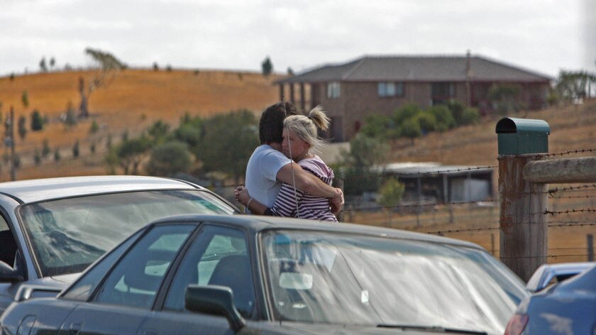 Residents comfort each other in Kinglake