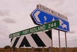 Road sign pointing the way to Broome, Port Hedland and Port Smith