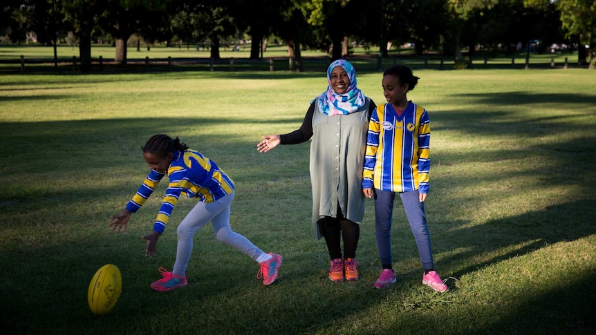 Fatima, Sanaa and Maryam Mohamed (left to right) at Princes Park training.