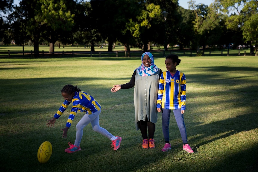 Fatima, Sanaa and Maryam Mohamed (left to right) at Princes Park training.