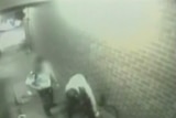 The video recording released by police shows Price holding a man to the ground and pushing a firehose into his face.