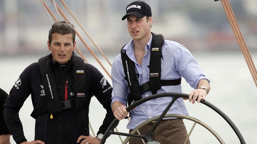 LtoR Dean Barker looks on as Prince William steers a 'NZL41' America's Cup yacht