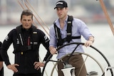 LtoR Dean Barker looks on as Prince William steers a 'NZL41' America's Cup yacht