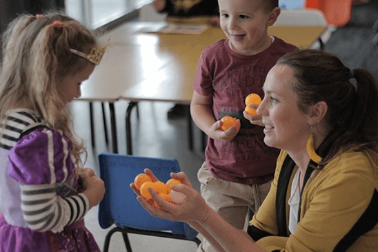 Cat Sewell with children