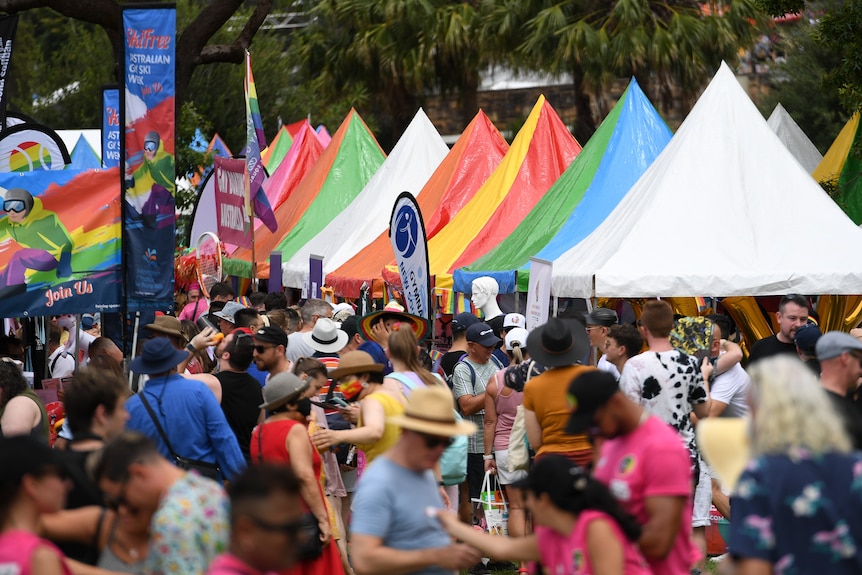 People attend the Sydney WorldPride 2023 fair day in Sydney in 2023