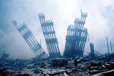 The rubble of the World Trade Centre towers smoulder on September 11, 2001. (AFP: Alexandre Fuchs)
