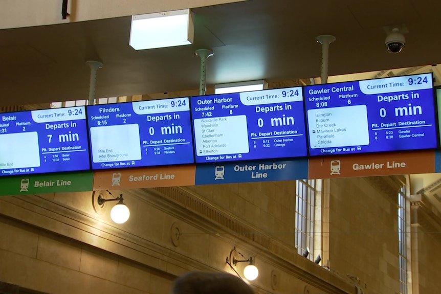 Signs indicating train arrivals on various train lines