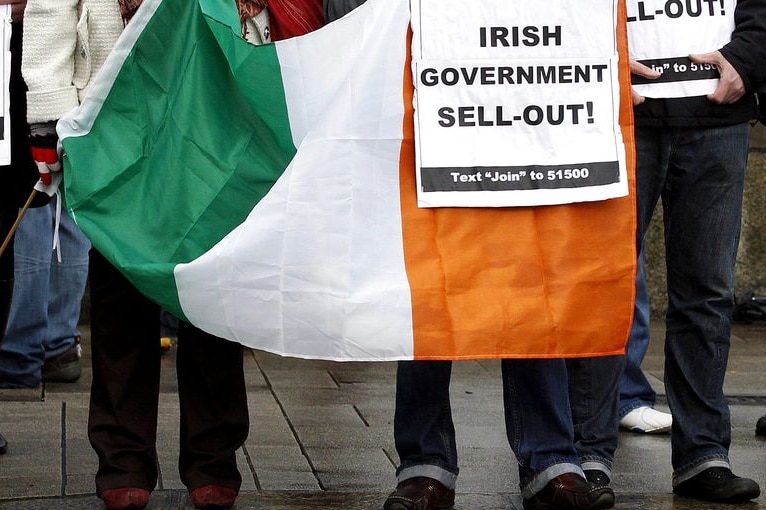 Protesters demonstrate outside Leinster House in Dublin (Reuters)