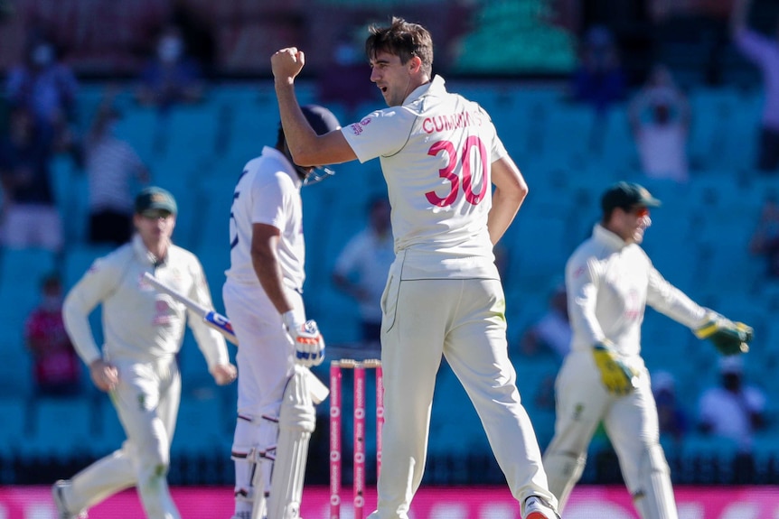 Australia bowler Pat Cummins clenches his fist in glee after an Indian wicket at the SCG.