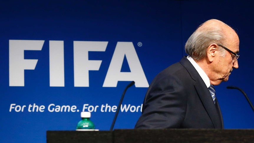 Sepp Blatter leaves stage after quitting