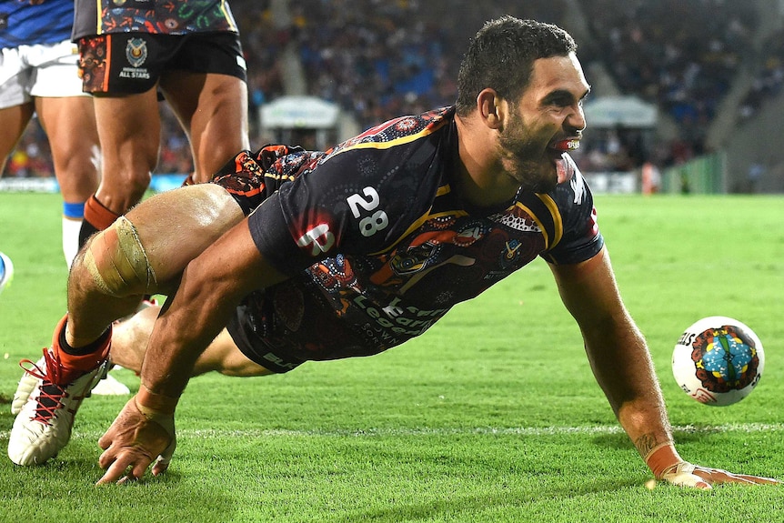 Greg Inglis does the goanna