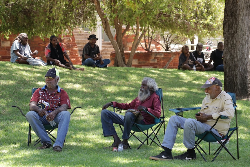Community members gathered outside the coroner's court in Alice Springs.