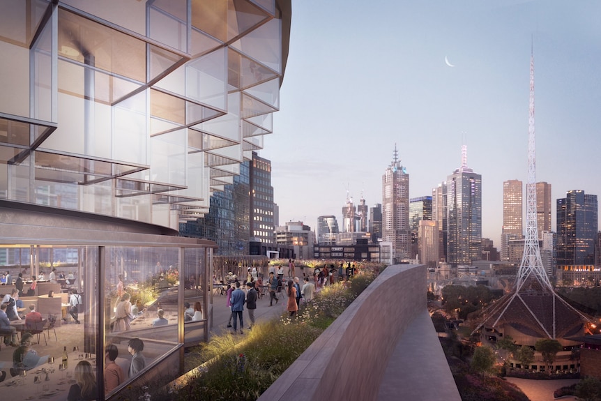 Expansive terrace with a restaurant and view of the Melbourne CBD, with people gathered on the terrace