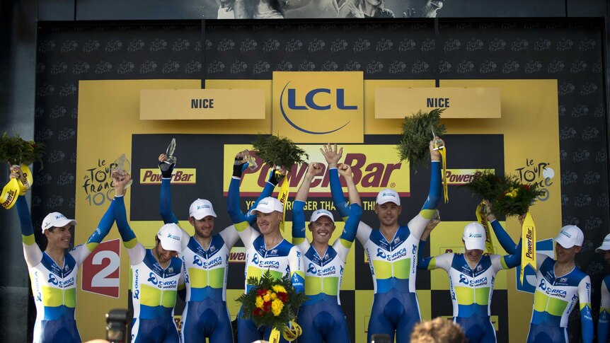 Greenedge team celebrates time trial win at Tour de France