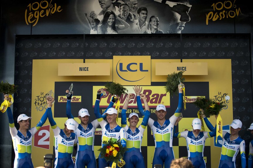Greenedge team celebrates time trial win at Tour de France