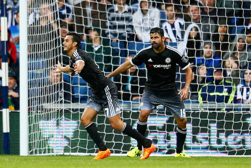 Pedro (L) celebrates scoring in Chelsea's Premier League match against West Bromwich Albion.
