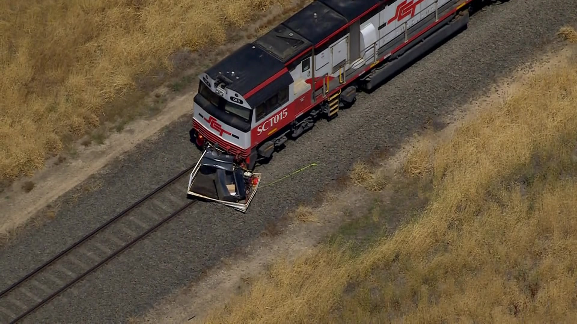 Two die as car and train collide at level crossing west of Geelong