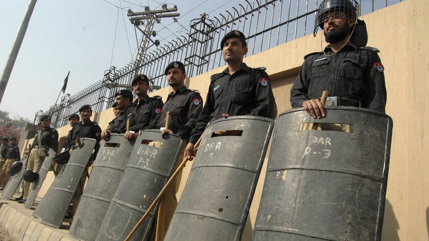 Police officers guard the Peshawar High Court