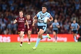 NSW rugby league star Latreell Mitchell runs in to score a try for the Blues in State of Origin.