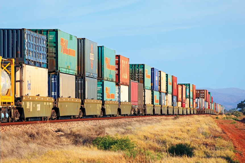 Train with double-stacked containers.