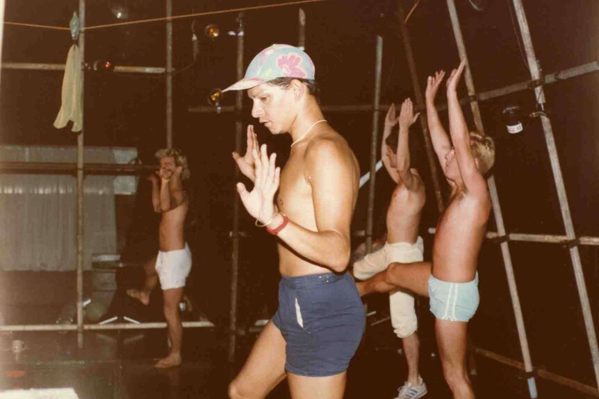 Topless men rehearse for a dance show at Connections.