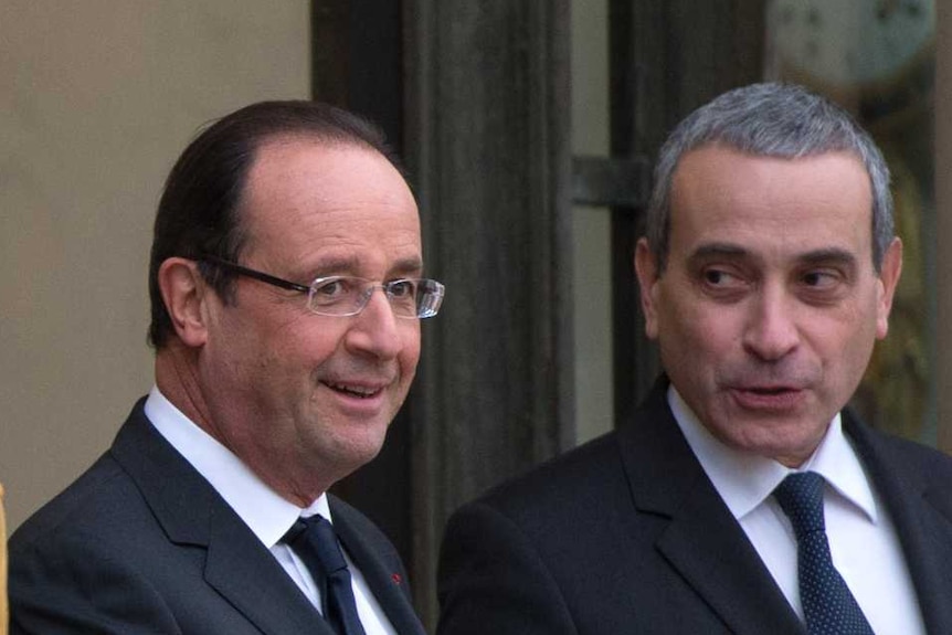 French president Francois Hollande and Laurent Stefanini