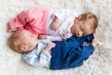 Non-identical twin baby boy and girl