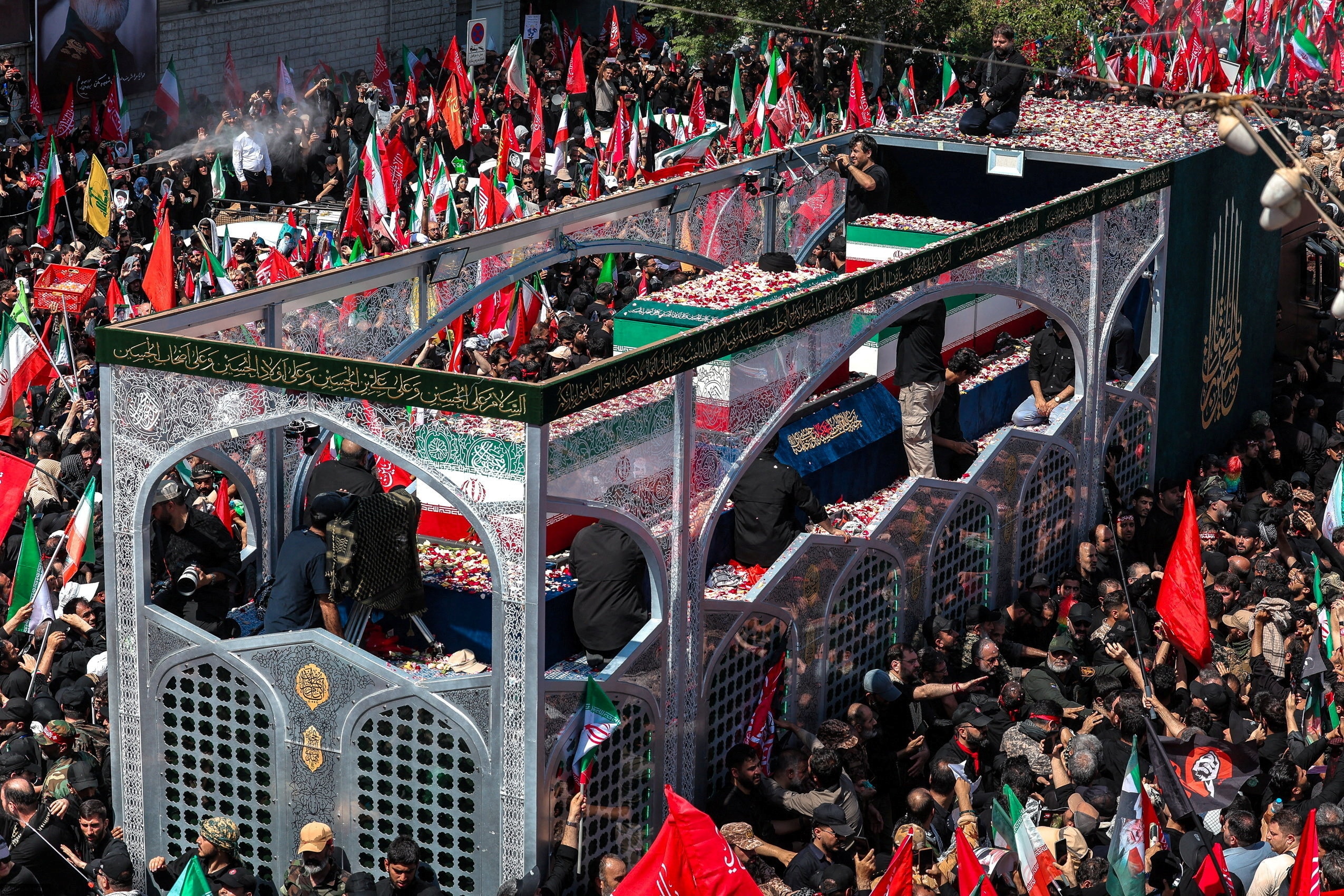 Mourners throng funeral procession in Tehran for Ali Khamenei