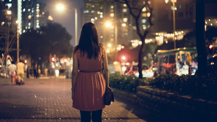 woman alone at night