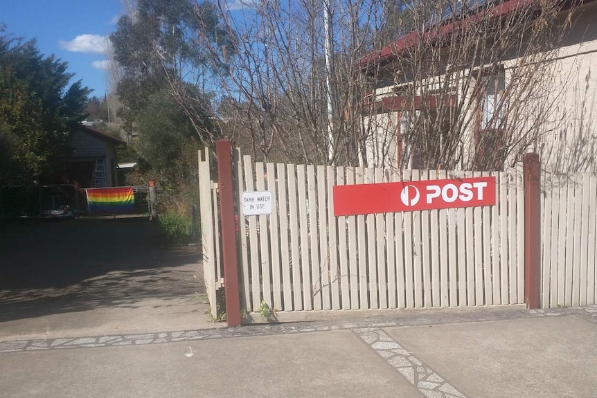 A flag on a gate.