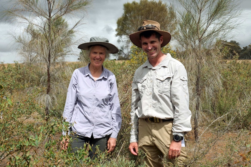 Libby Sandiford and Andrew Crawford standing in the bush.