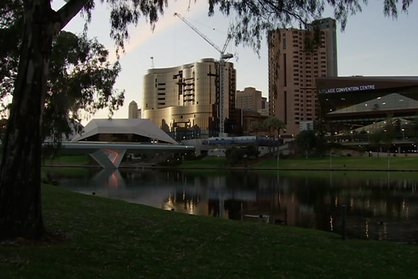 A river with tall buildings behind