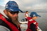Peter Glowacki fishing with two of his kids.