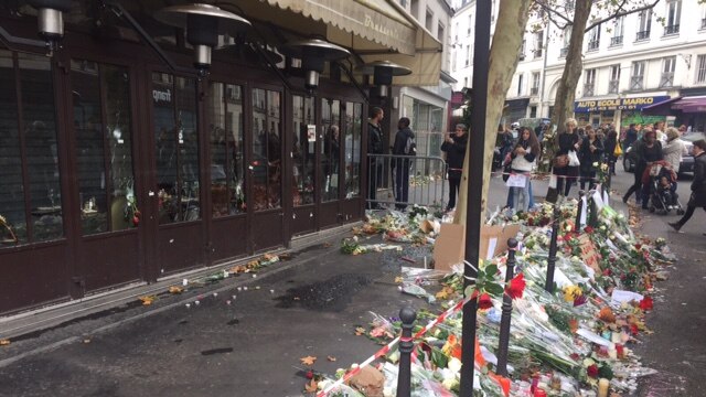 On the street outside a restaurant in Paris where gunmen shot diners in Paris attacks