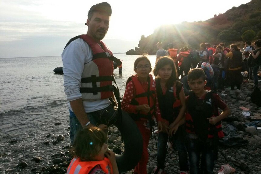 Hussam Hafi and his four children before their terrifying journey from Turkey to Greece in a rubber boat