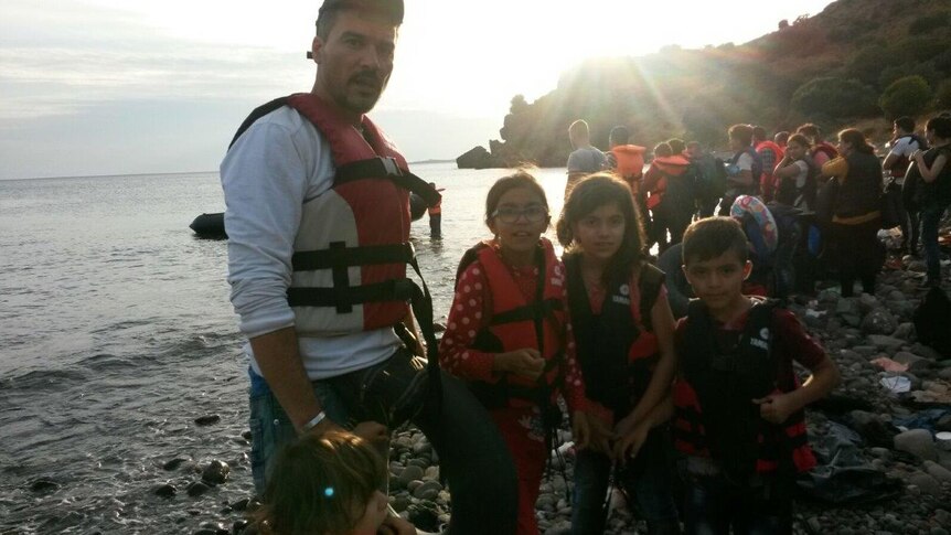 Hussam Hafi and his four children before their terrifying journey from Turkey to Greece in a rubber boat