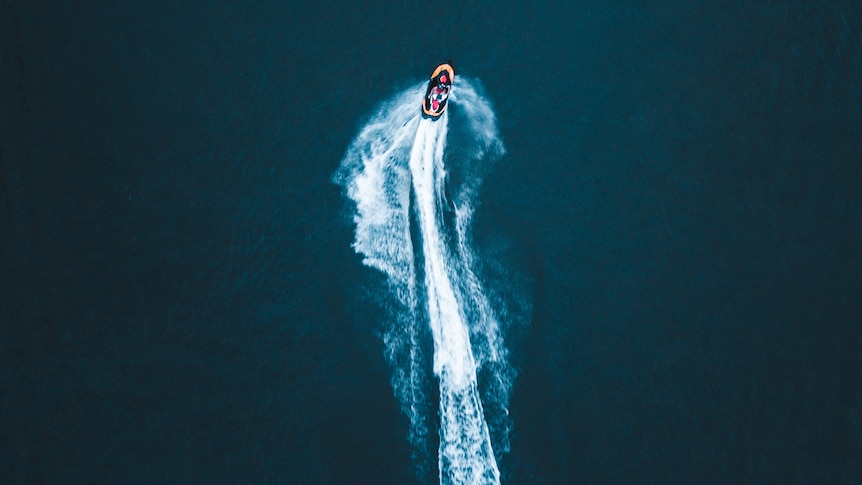 A jet ski driving on open ocean
