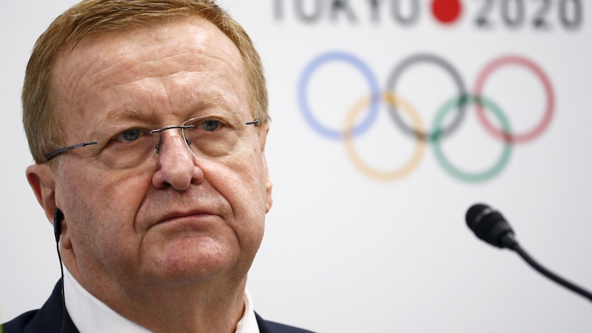 John Coates attends a news conference in Tokyo