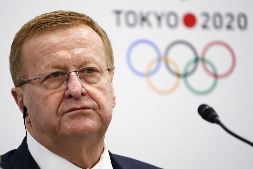 John Coates attends a news conference in Tokyo