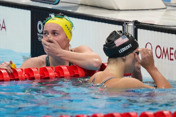 Ariarne Titmus celebrates after overtaking Ledecky in the final lap to claim victory.