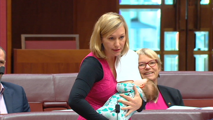 Greens senator Larissa Waters puts forward a motion while breastfeeding in the Senate.