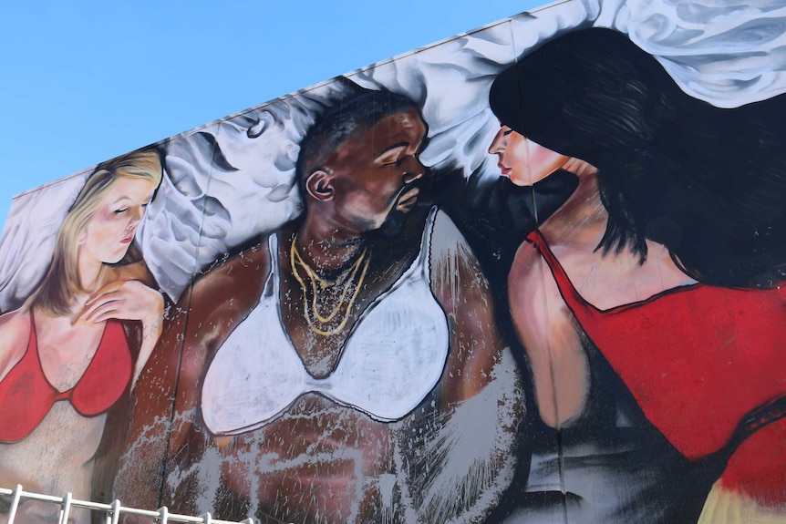 A mural of Kanye West, Kim Kardashian, Taylor Swift by Melbourne artist Lushsux.