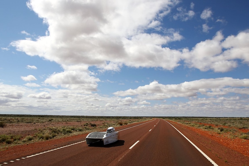 A solar car on the road between Darwin and Adelaide.