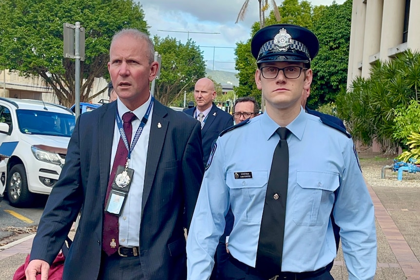 Two police representatives outside court 