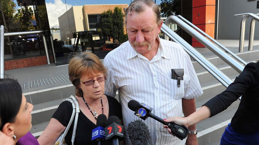 Valmer and Brian Britcher speak to journalists outside the Toowoomba courthouse