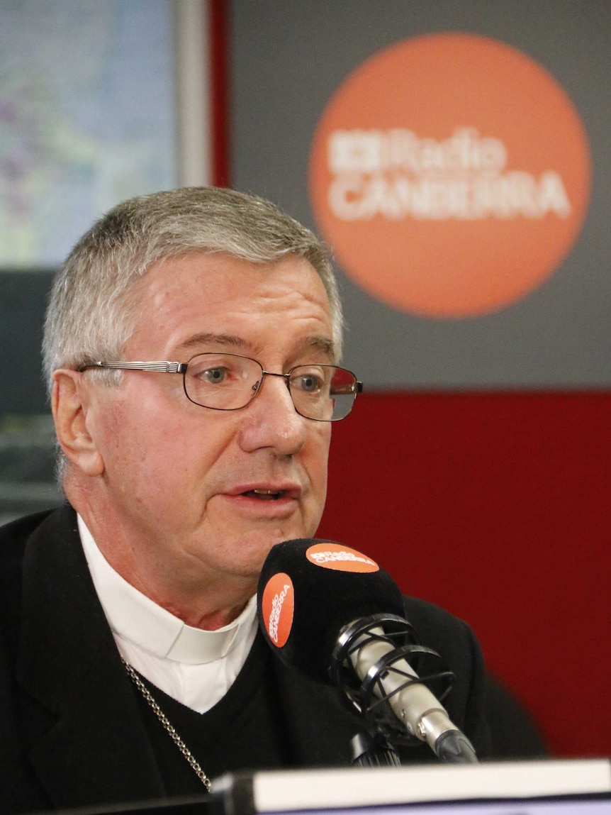 Archbishop Christopher Prowse being interviewed in the ABC Radio Canberra studio.
