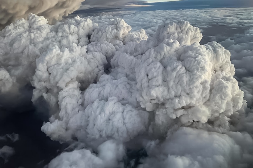 A massive, thick and smoky cloud from above.