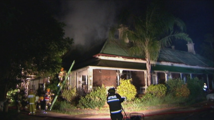 Firefighters battle blaze at historic homestead 'Hanworth House' in Lytton Road at East Brisbane on March 18, 2013