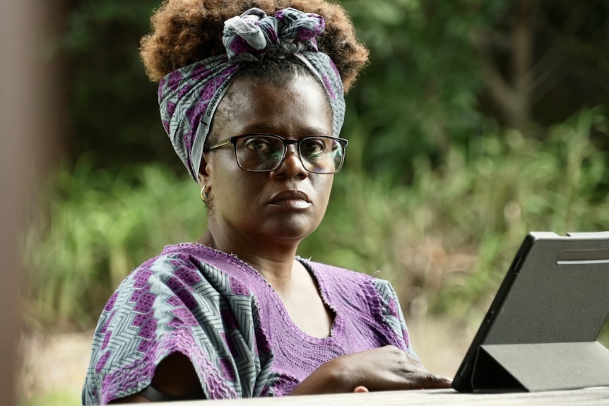 An African woman in the park