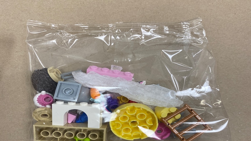 Crystal methamphetamine shards in Lego bag.